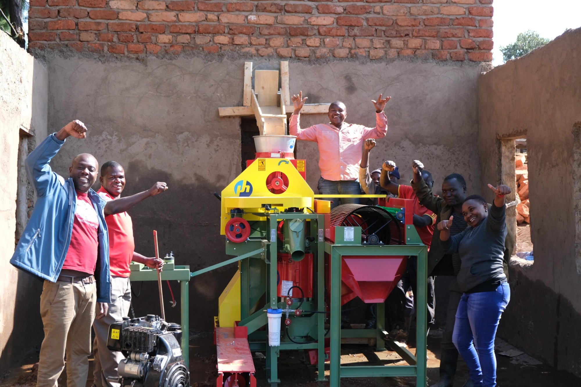 Tanzania-Iloma-Receiving-Ecopulper-min-scaled-1.jpg